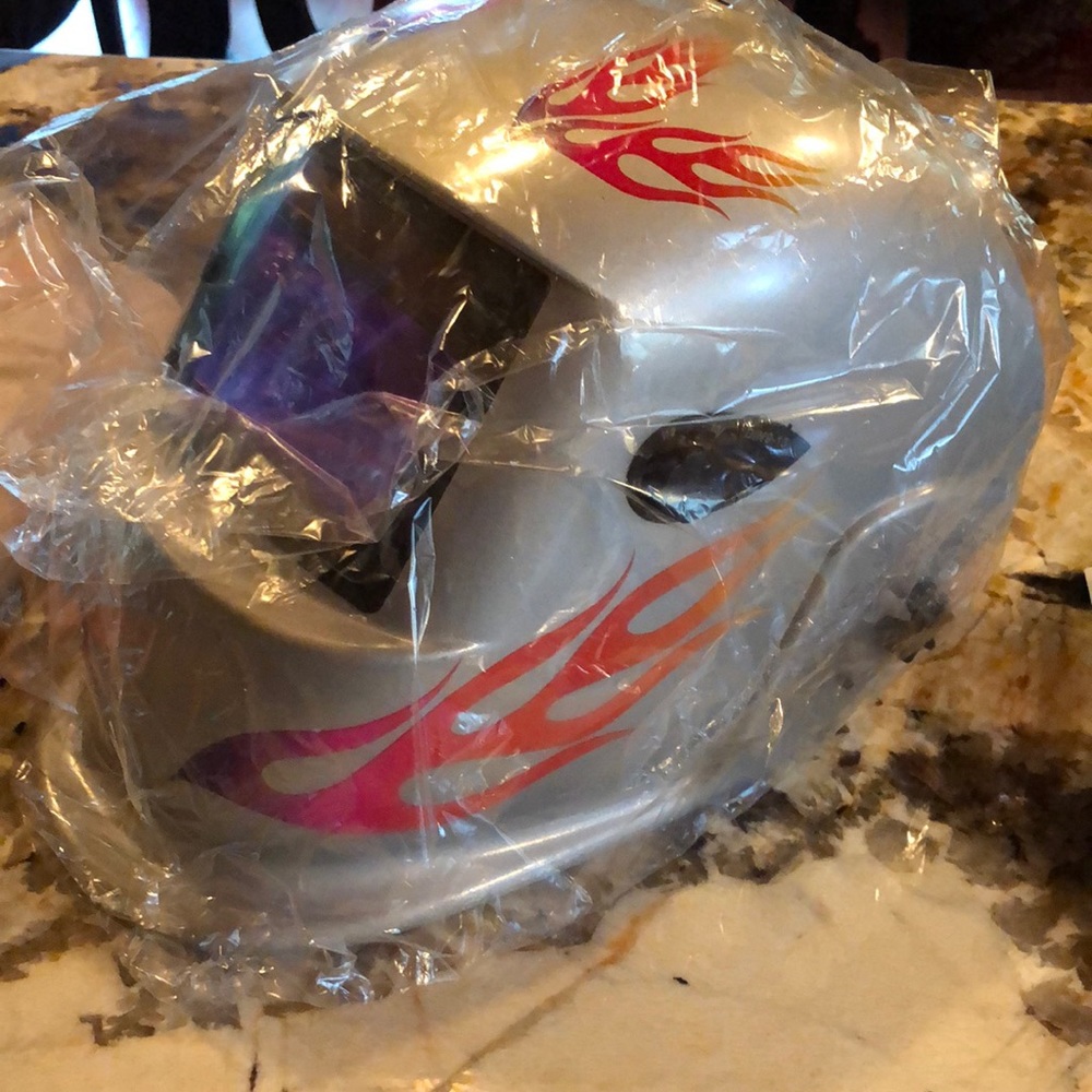Welding helmet and gloves